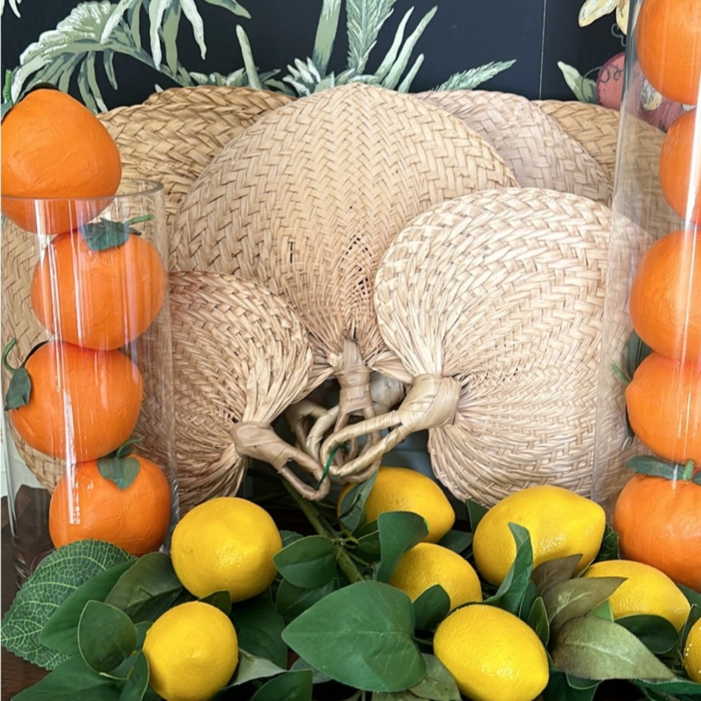 7 various size rattan hand fans.